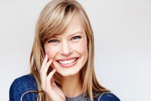 woman smiling after botox