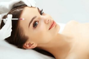 woman receiving dermal fillers