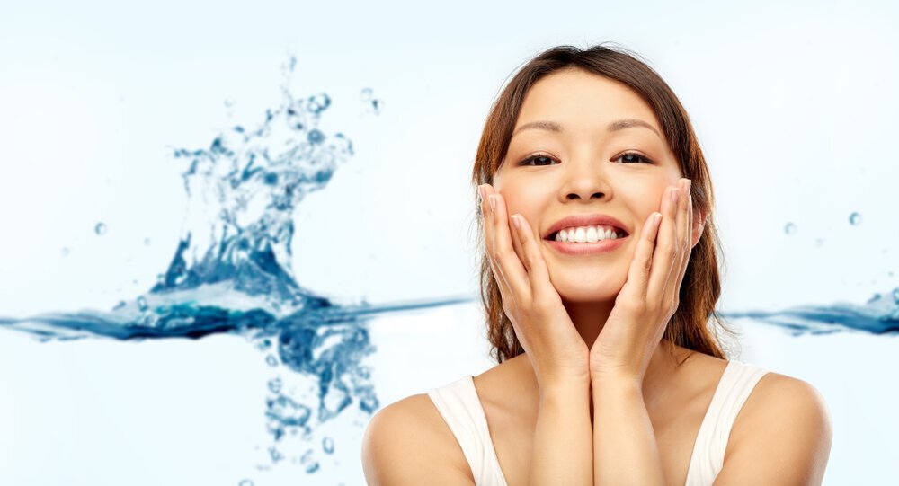 Woman enjoying facial treatment