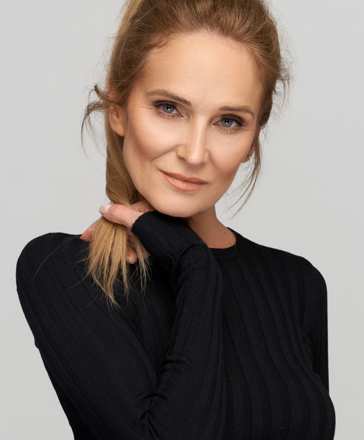 New Jersey Fat Injections model wearing black