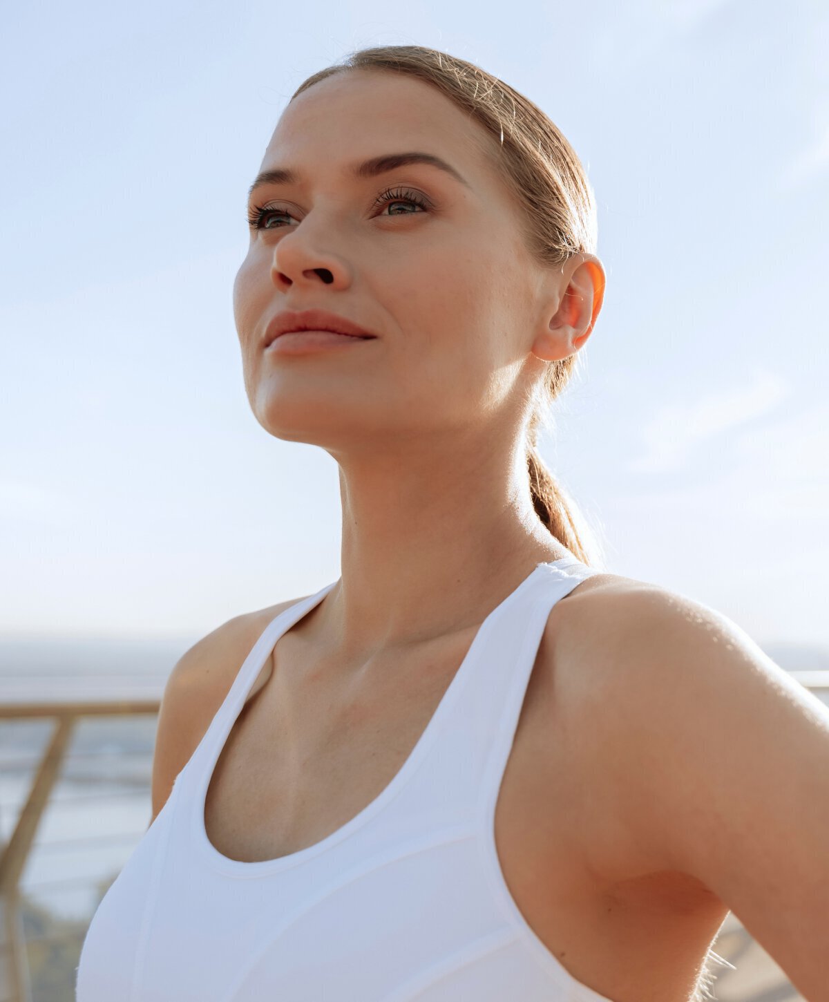 New Jersey MedSpa model wearing a white top