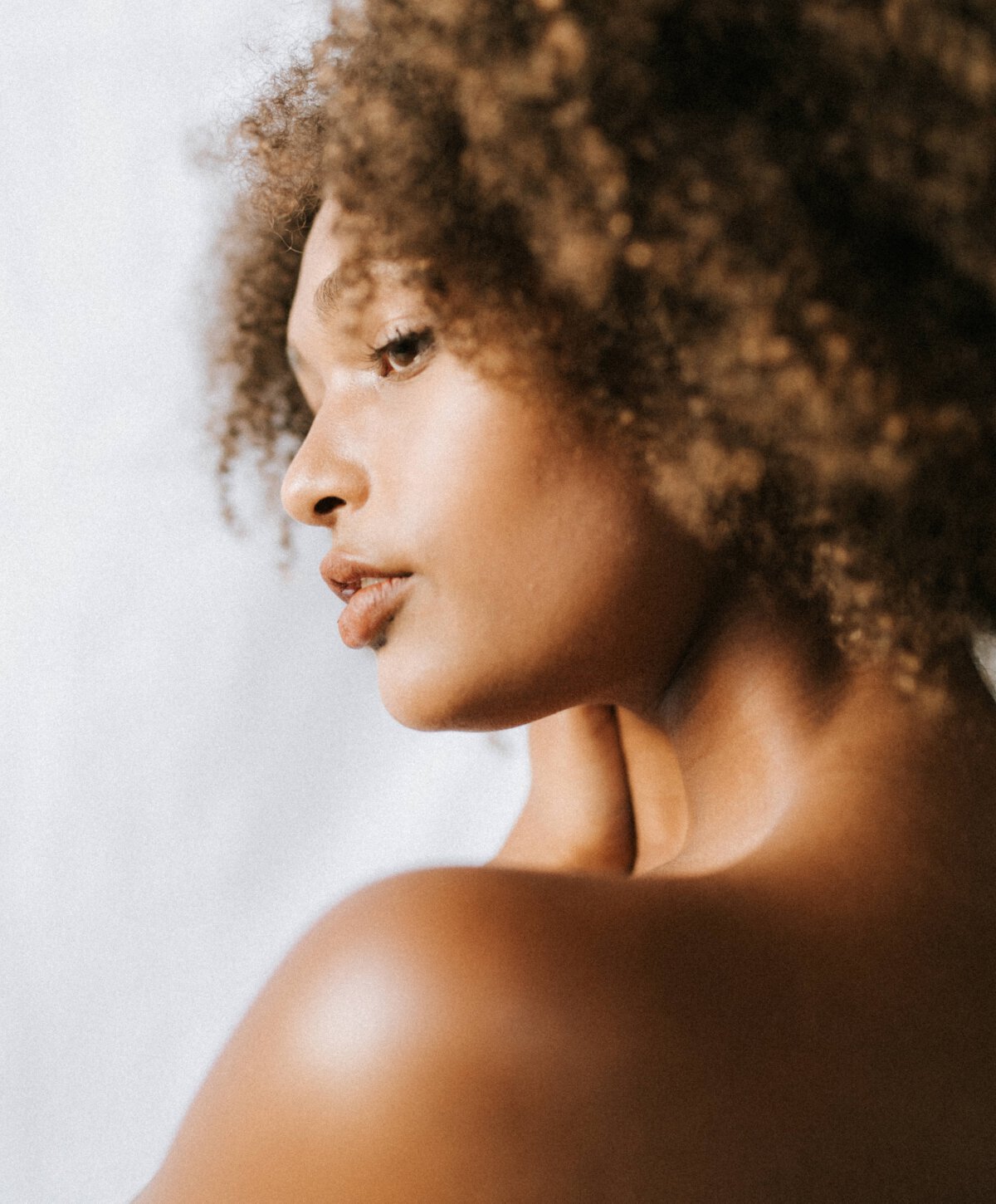 New Jersey Restylane model looking over shoulder