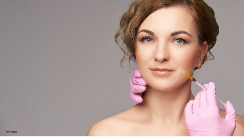 Woman getting injection